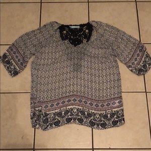 Cute silk top with a lace open back